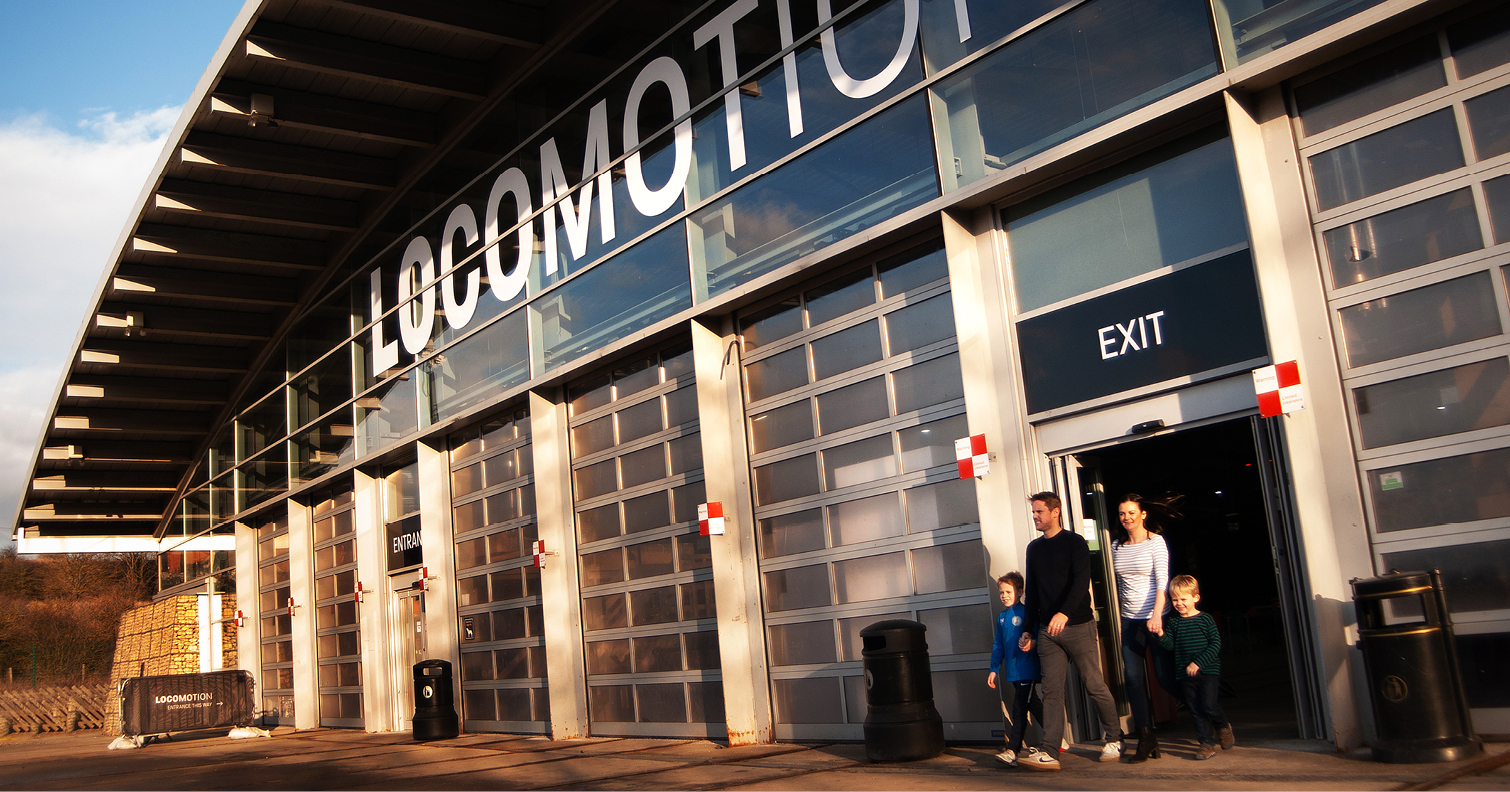 family walking outside of the collections hall at Locomotion, Shildon